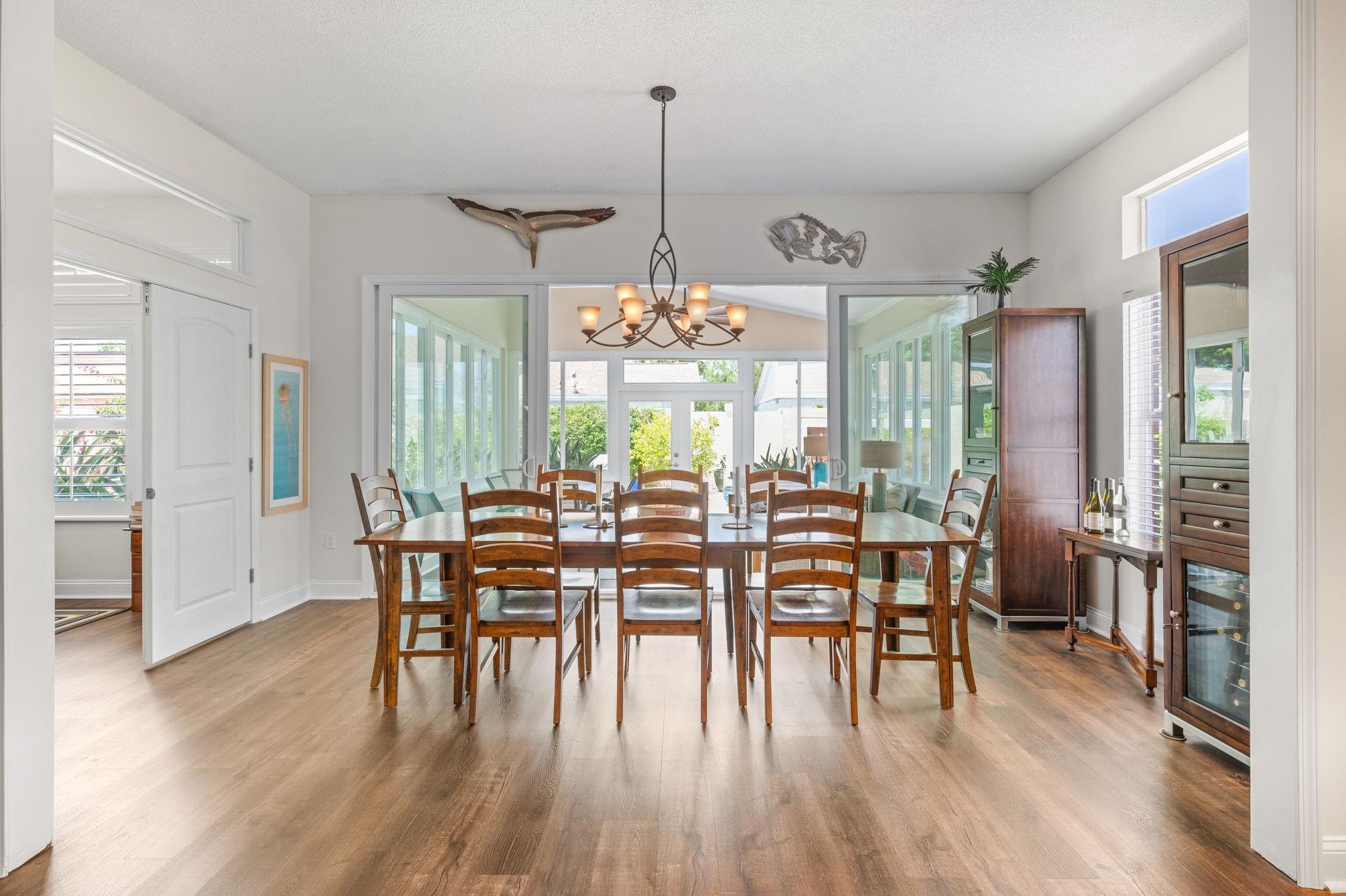 322 Monika Place St. Augustine, FL 32080 - Photo 30 of 55 a view of a dining room with furniture window and wooden floor