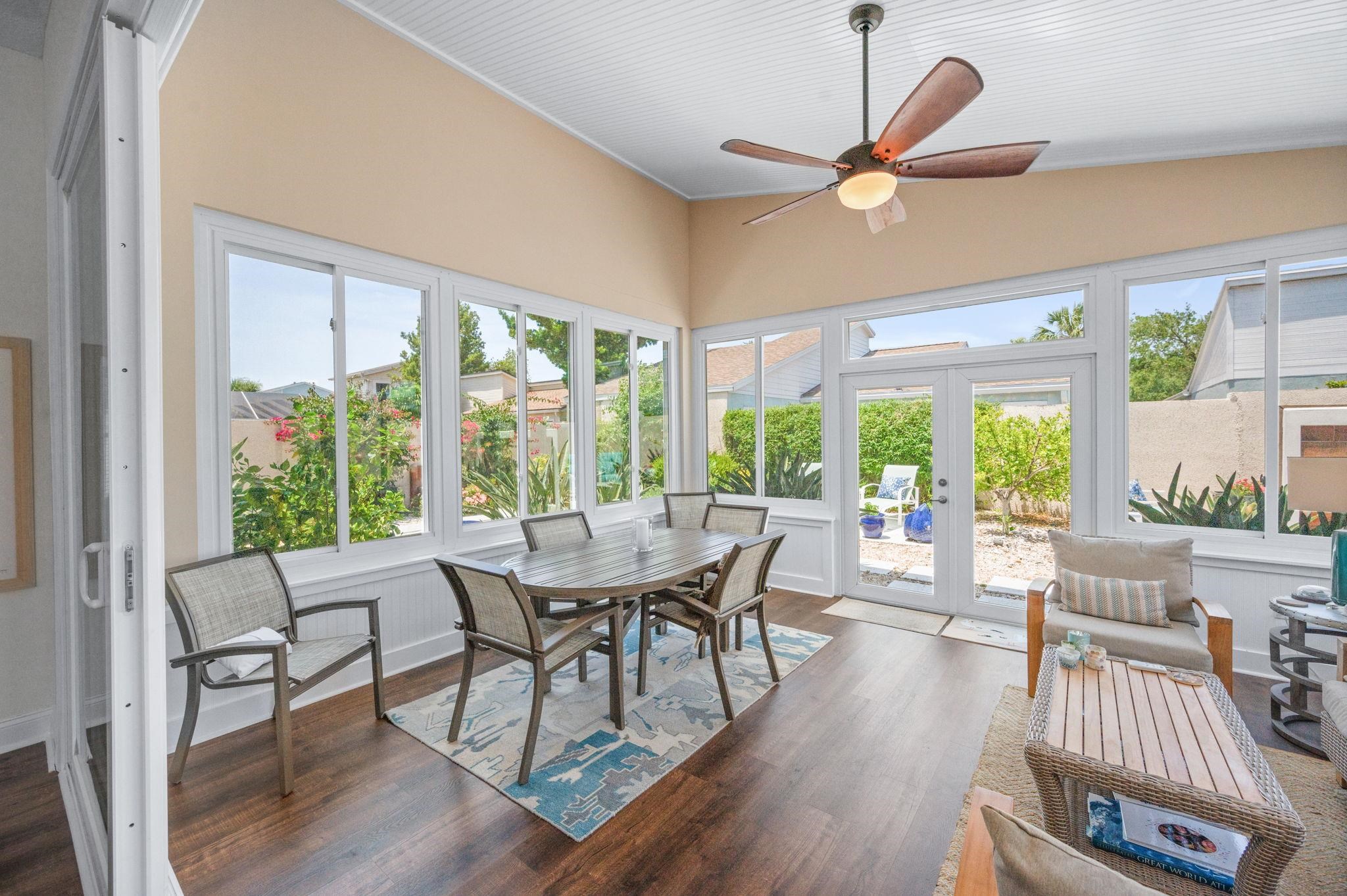322 Monika Place St. Augustine, FL 32080 - Photo 34 of 55 a dining room with furniture window and wooden floor