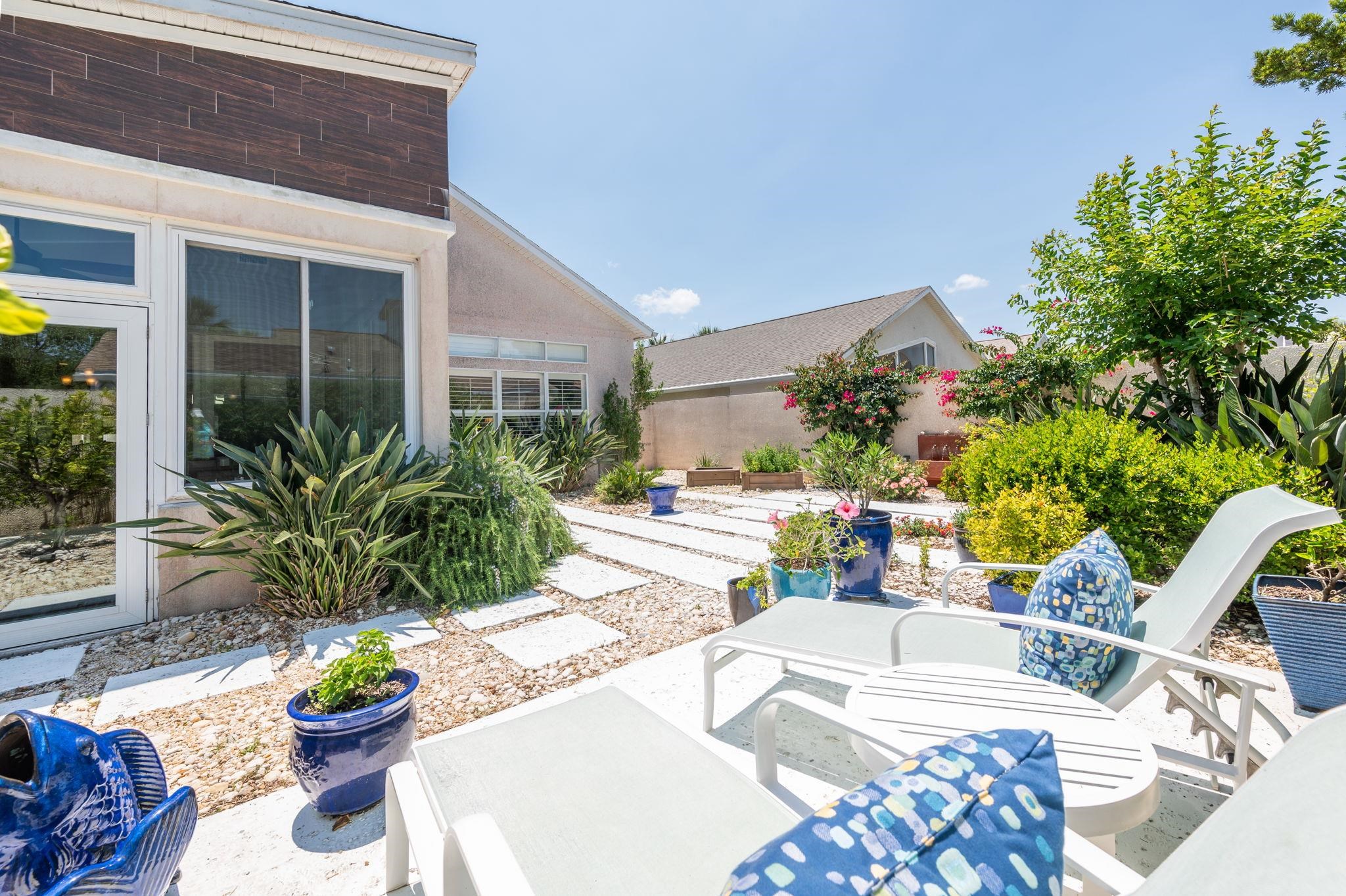 322 Monika Place St. Augustine, FL 32080 - Photo 49 of 55 a view of a chairs and table in a patio