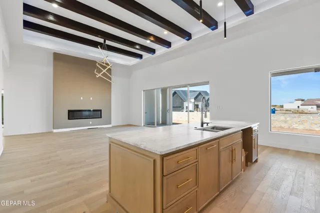 a view of a kitchen with a sink