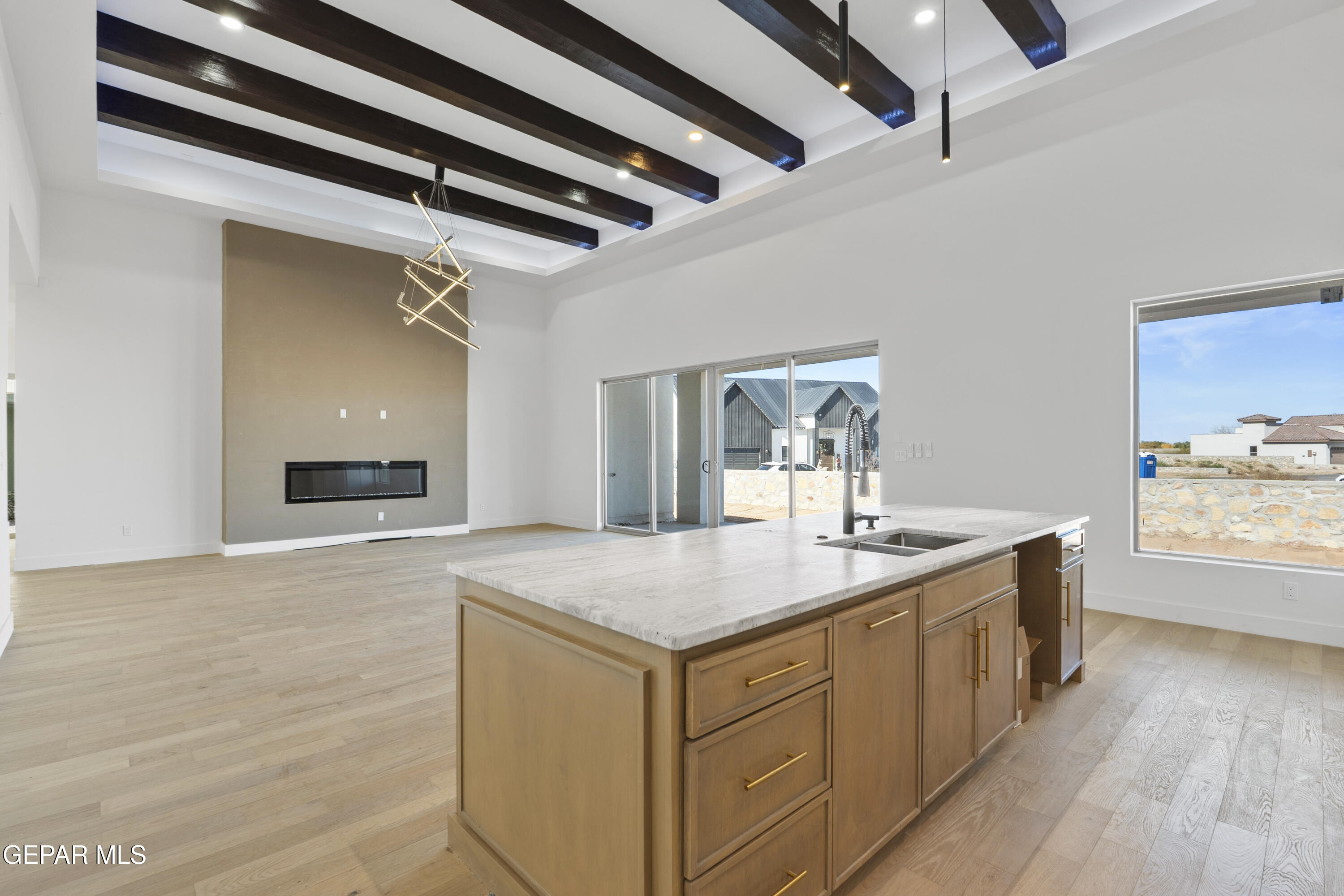 5659 Rio Bonito Circle El Paso, TX 79932 - Photo 19 of 55 a room with a sink and a wooden floor
