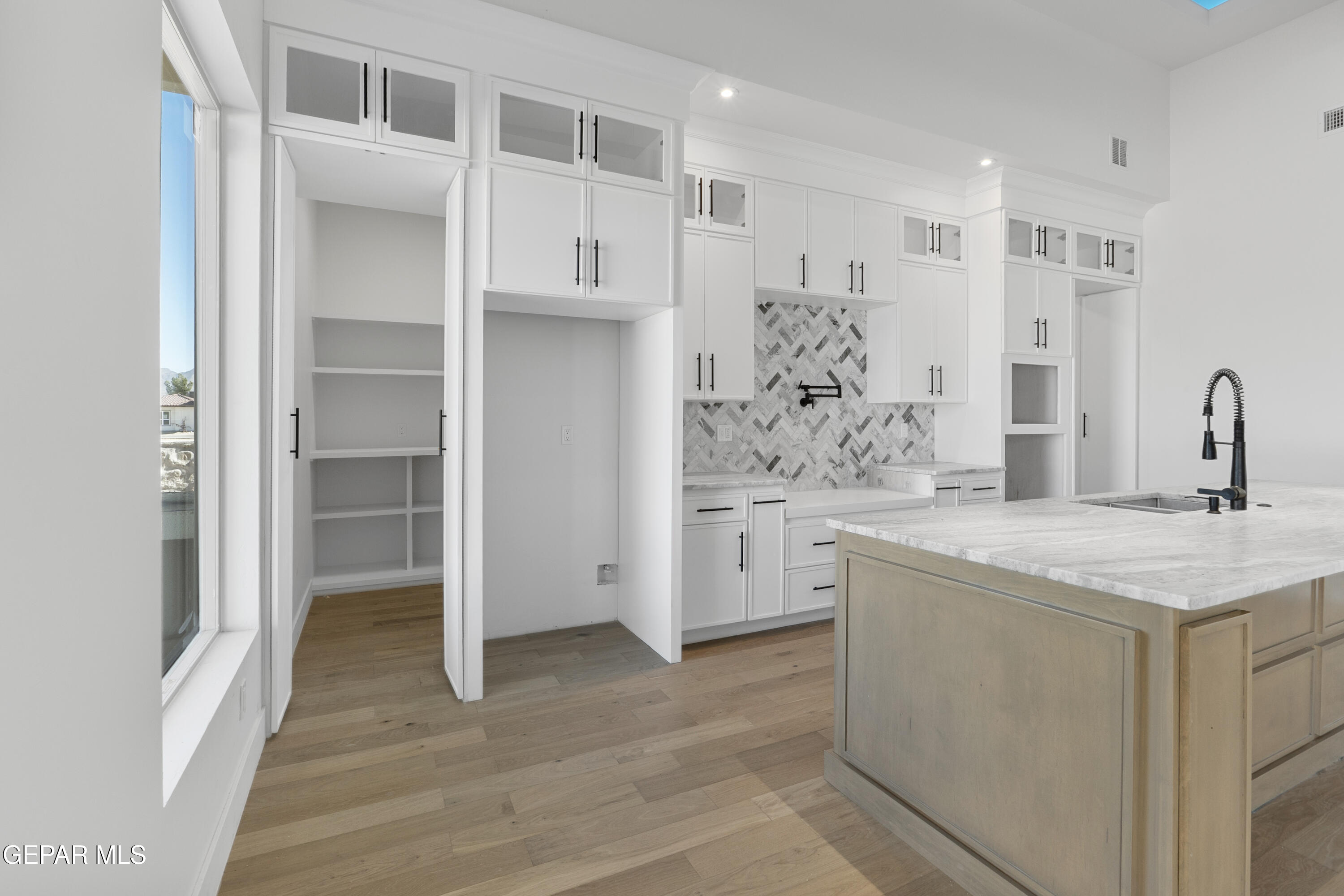 5659 Rio Bonito Circle El Paso, TX 79932 - Photo 22 of 55 a view of a kitchen with a sink