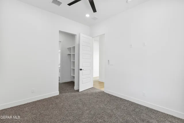 a bathroom with a shower and a toilet
