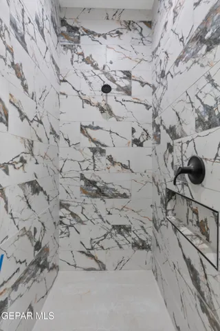 a view of a hallway with a closet