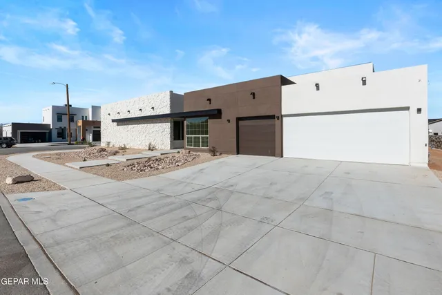 a view of kitchen with sink refrigerator and microwave