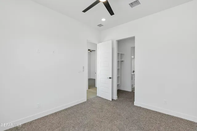 wooden floor in an empty room and a window