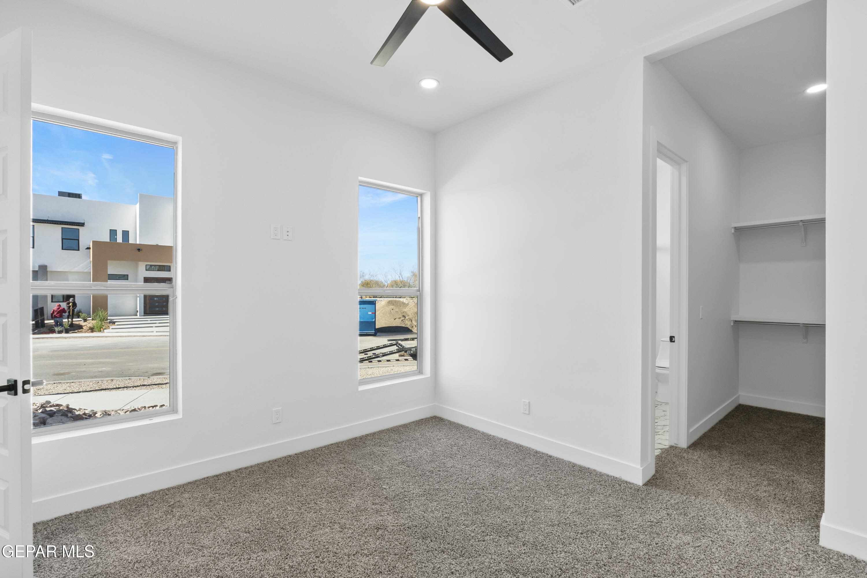 5659 Rio Bonito Circle El Paso, TX 79932 - Photo 36 of 55 wooden floor in an empty room and a window