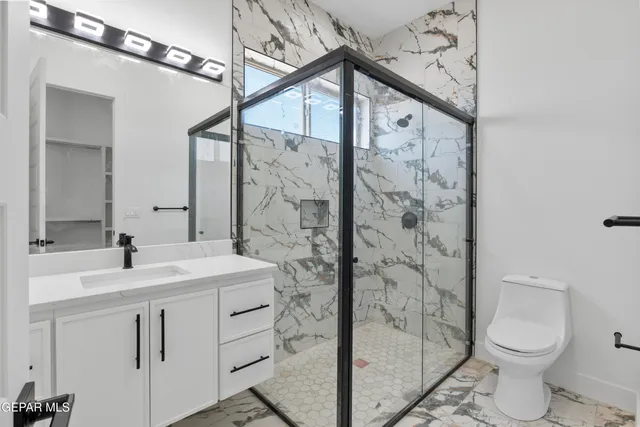 a view of an empty walk in closet