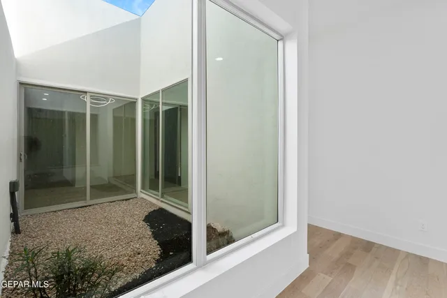 a view of a big room with carpet