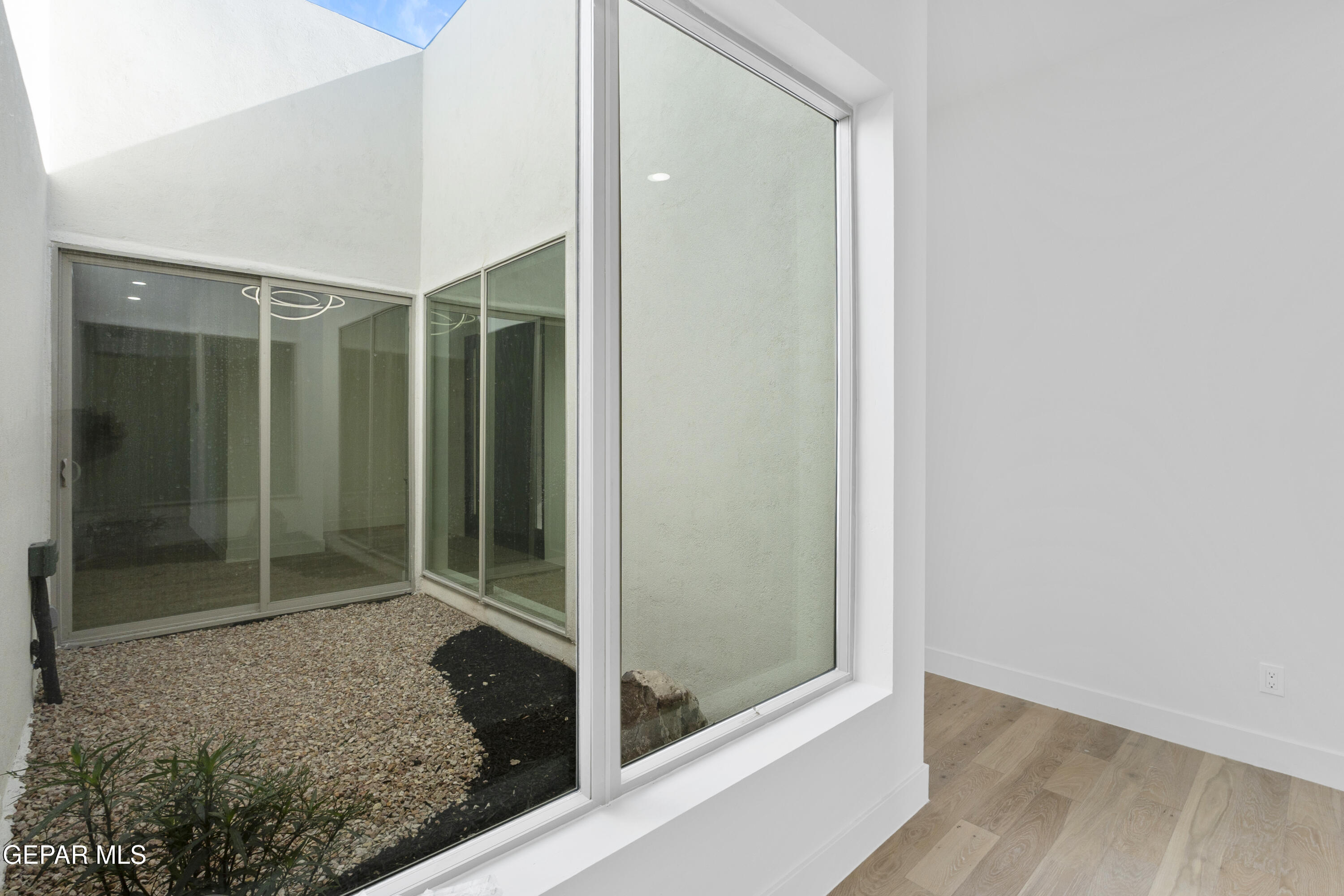 5659 Rio Bonito Circle El Paso, TX 79932 - Photo 39 of 55 a bathroom with a glass shower door and a bathtub