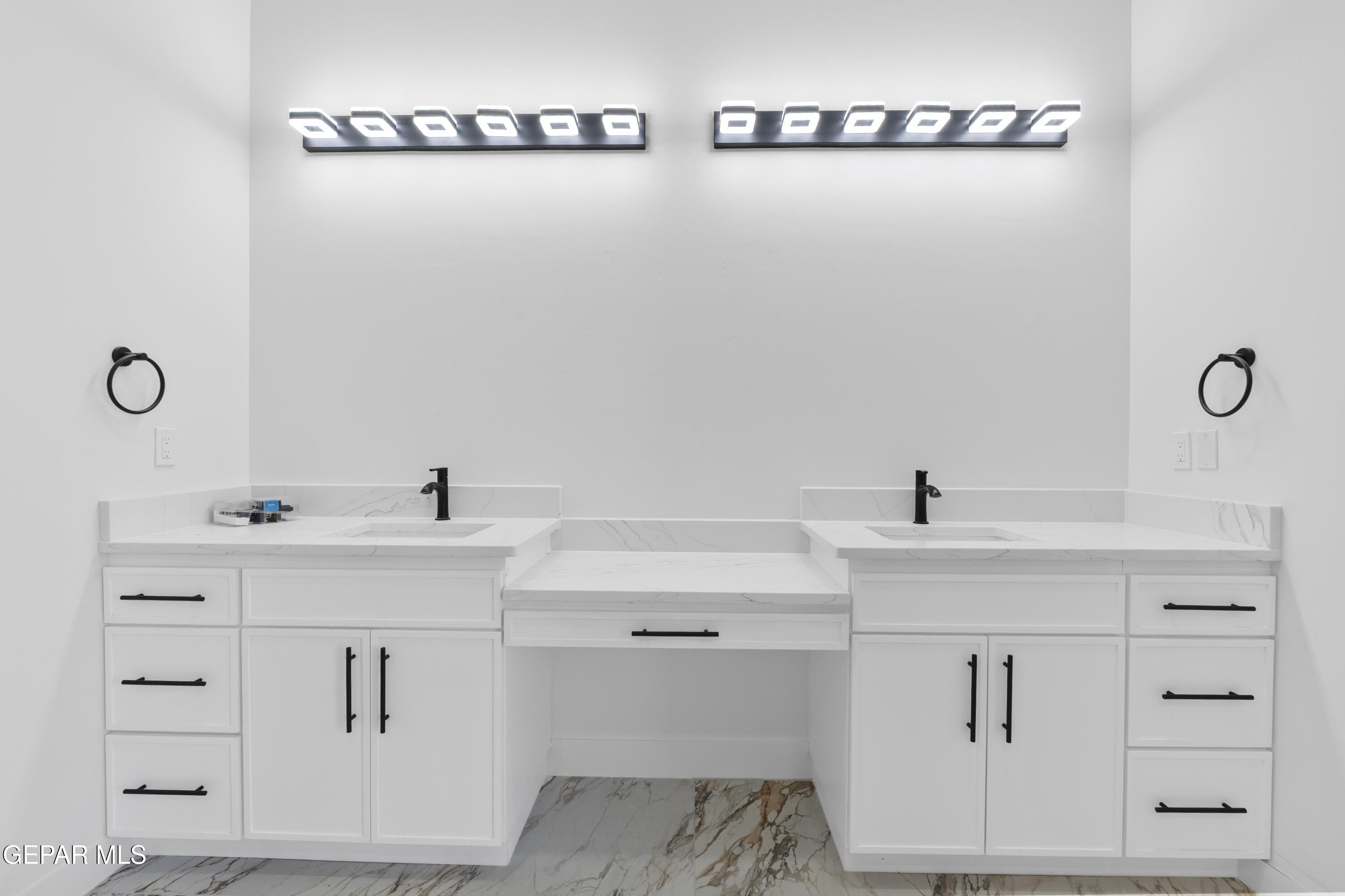 5659 Rio Bonito Circle El Paso, TX 79932 - Photo 48 of 55 a view of cabinets with sink