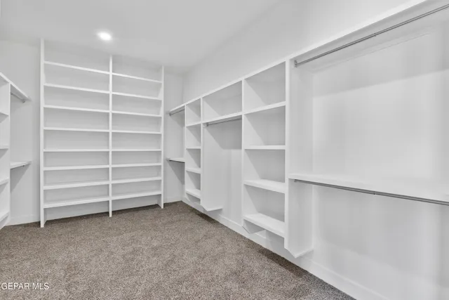 a view of a hallway with an empty room