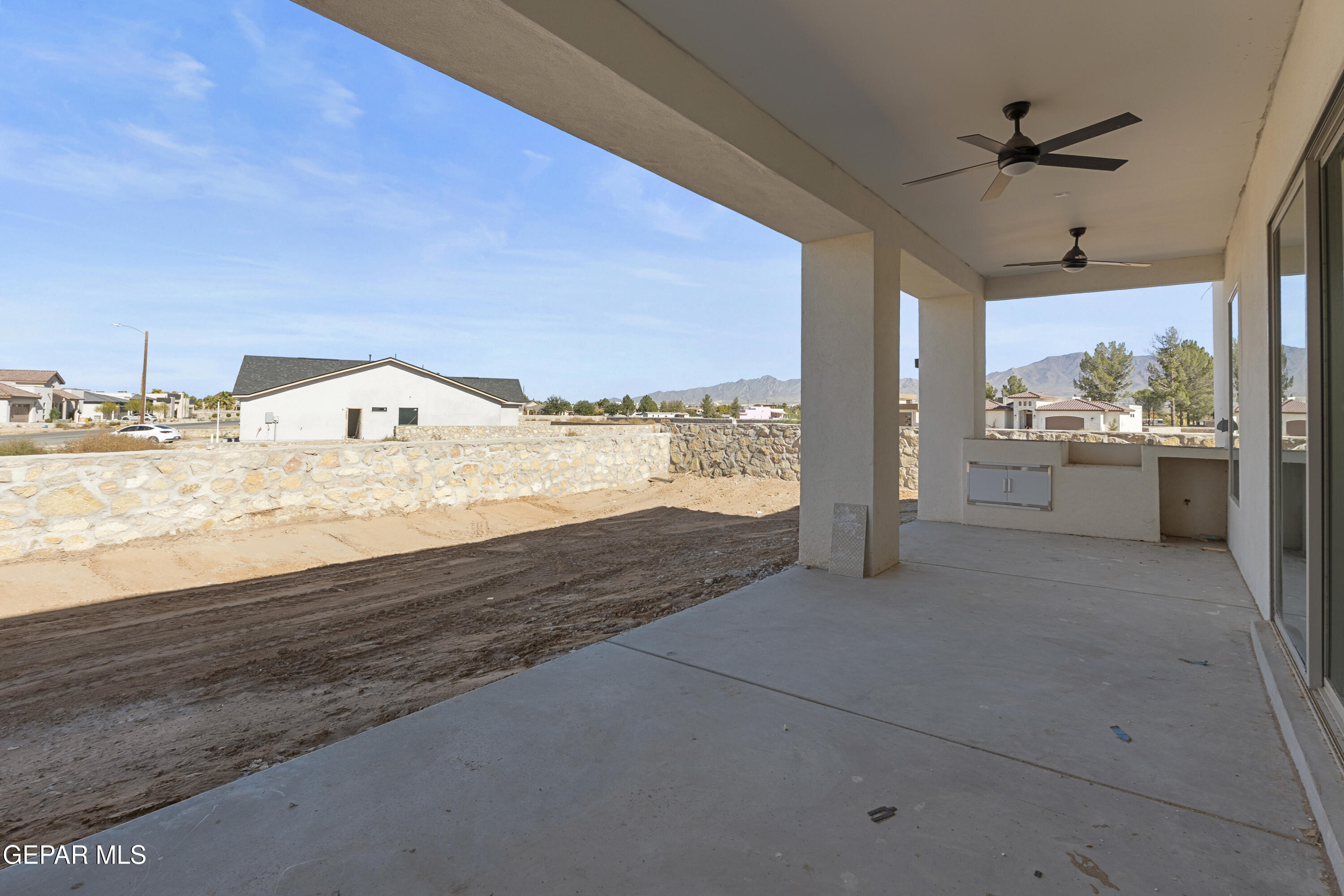 5659 Rio Bonito Circle El Paso, TX 79932 - Photo 51 of 55 a view of a big room with wooden floor and windows