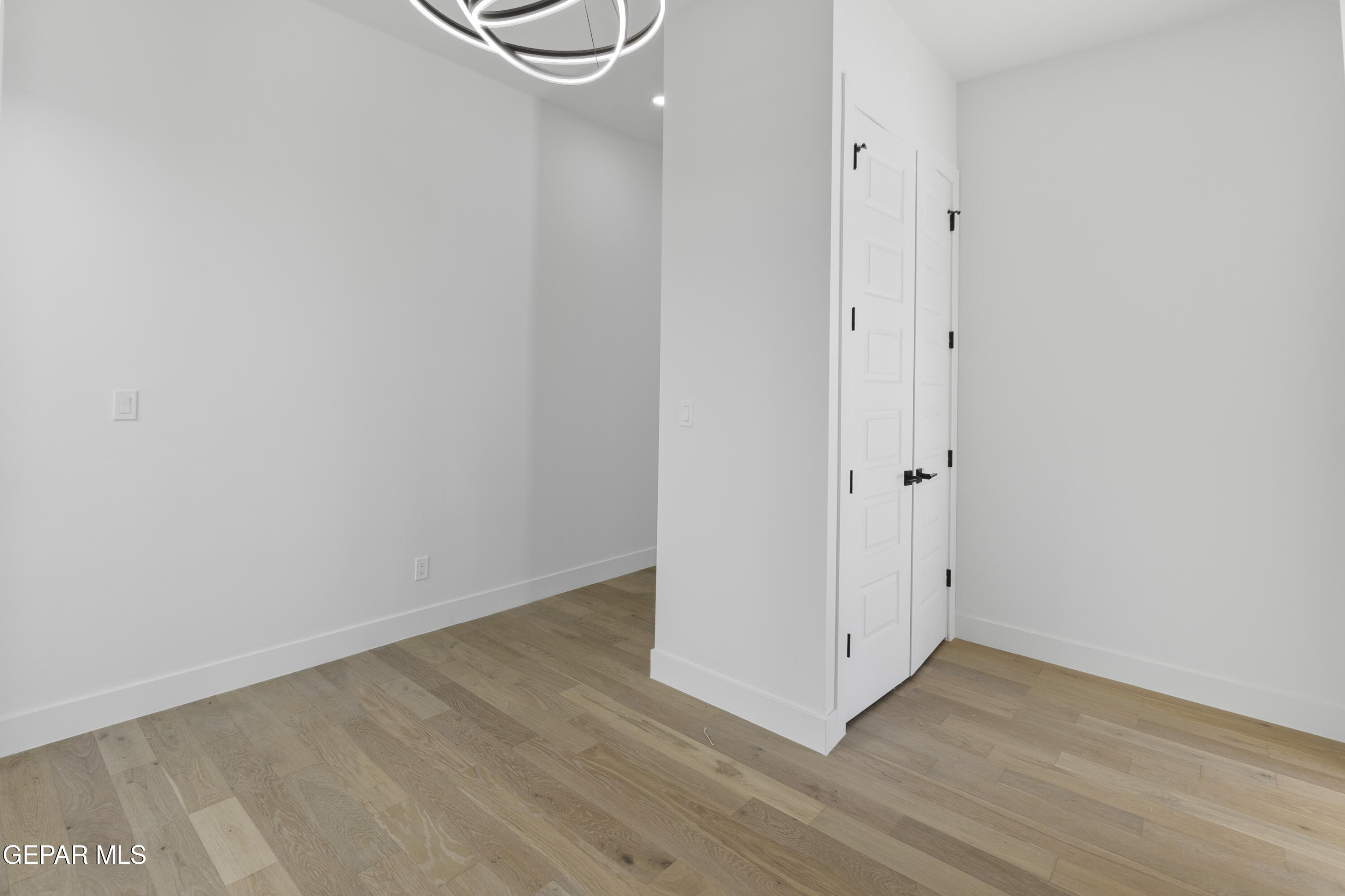5659 Rio Bonito Circle El Paso, TX 79932 - Photo 7 of 55 a view of a room with wooden floor