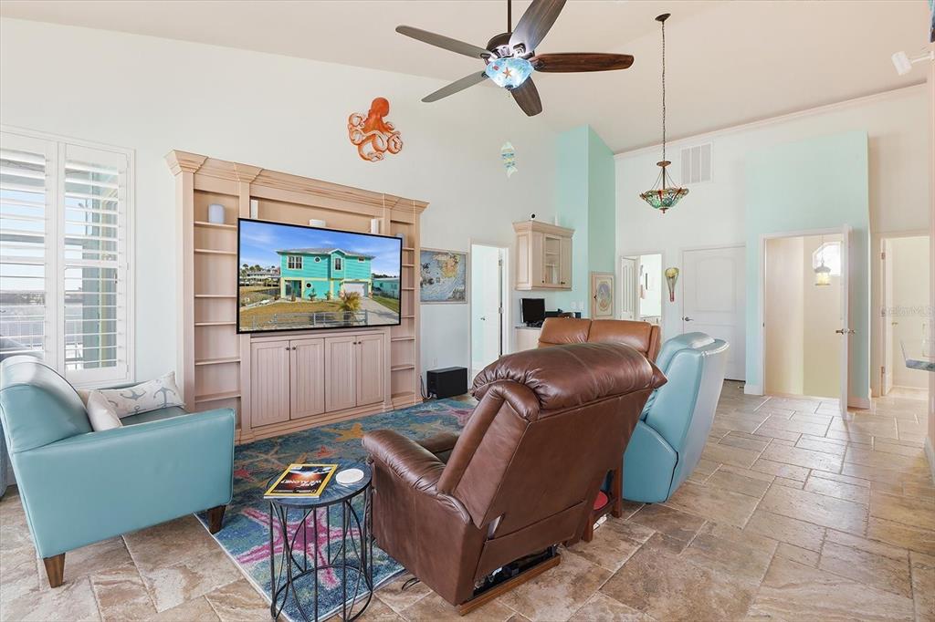 2571 North Seneca Point Crystal River, FL 34429 - Photo 12 of 58 a living room with furniture and a flat screen tv