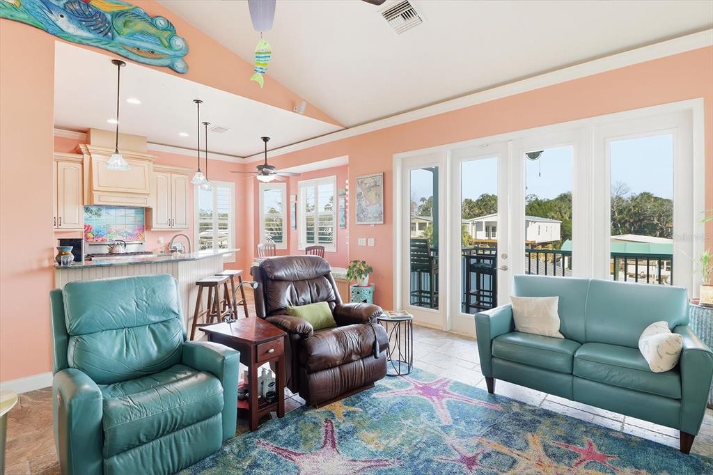 2571 North Seneca Point Crystal River, FL 34429 - Photo 13 of 58 a living room with furniture and a large window