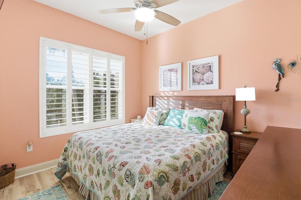 2571 North Seneca Point Crystal River, FL 34429 - Photo 21 of 58 a large bed sitting in a bedroom next to a window
