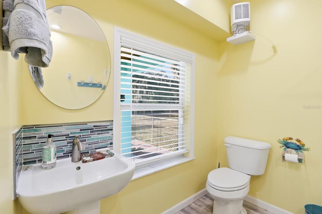 2571 North Seneca Point Crystal River, FL 34429 - Photo 7 of 58 a bathroom with a sink and a mirror