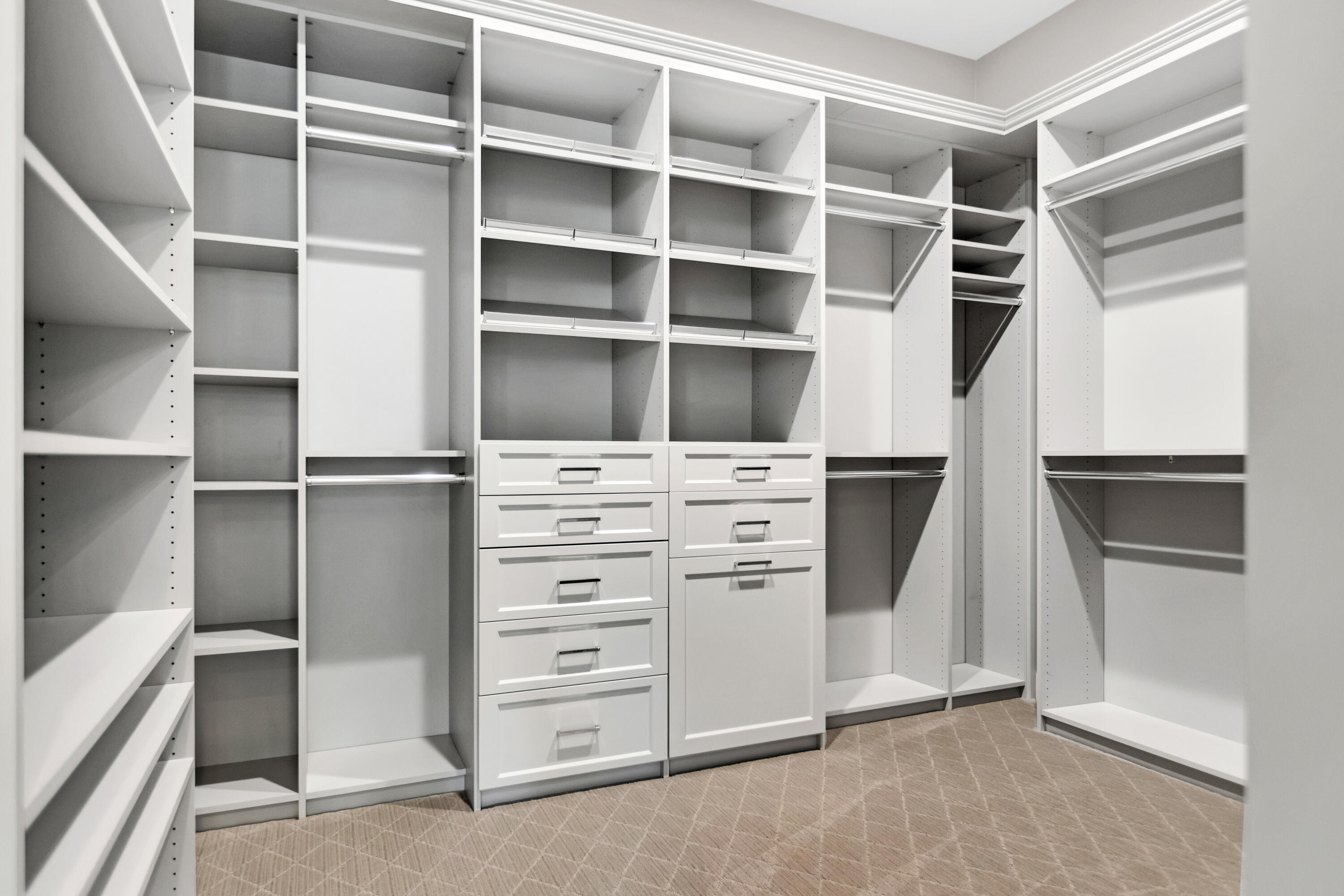 81925 Four Seasons Place La Quinta, CA 92253 - Photo 21 of 27 a view of walk in closet with empty racks