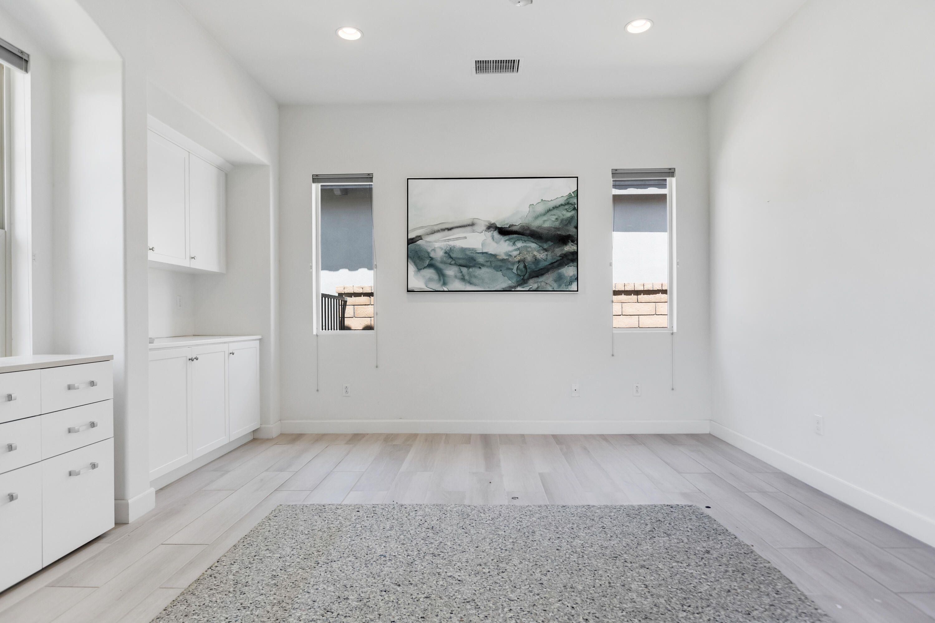 81925 Four Seasons Place La Quinta, CA 92253 - Photo 24 of 27 an empty room with closet and mirror