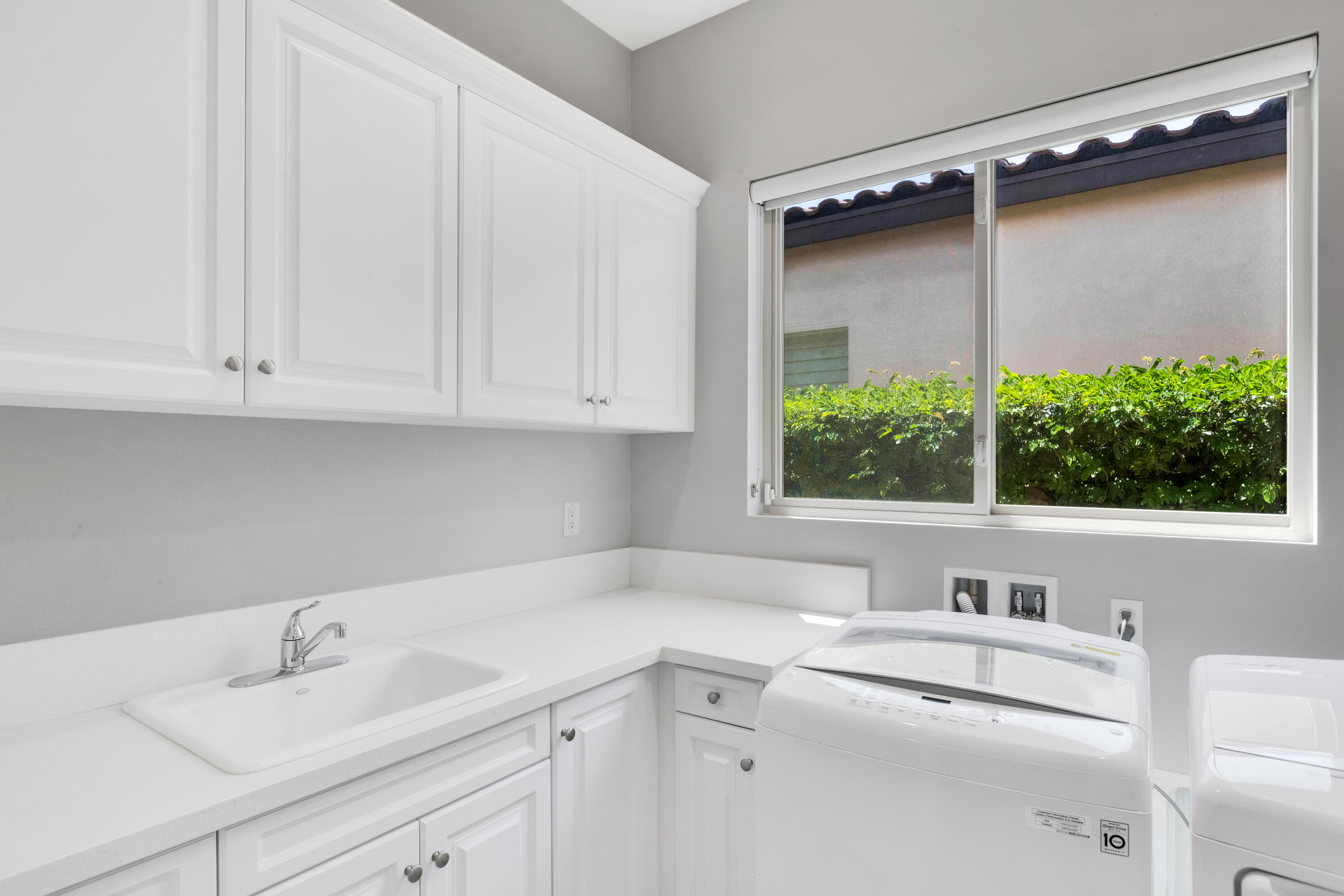 81925 Four Seasons Place La Quinta, CA 92253 - Photo 27 of 27 a kitchen with a sink cabinets and window