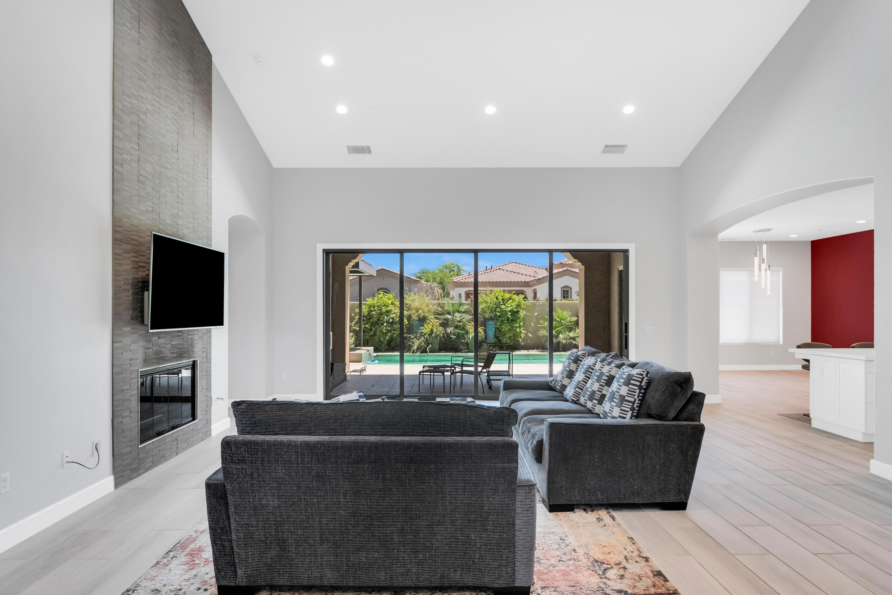 81925 Four Seasons Place La Quinta, CA 92253 - Photo 7 of 27 a living room with furniture and a flat screen tv