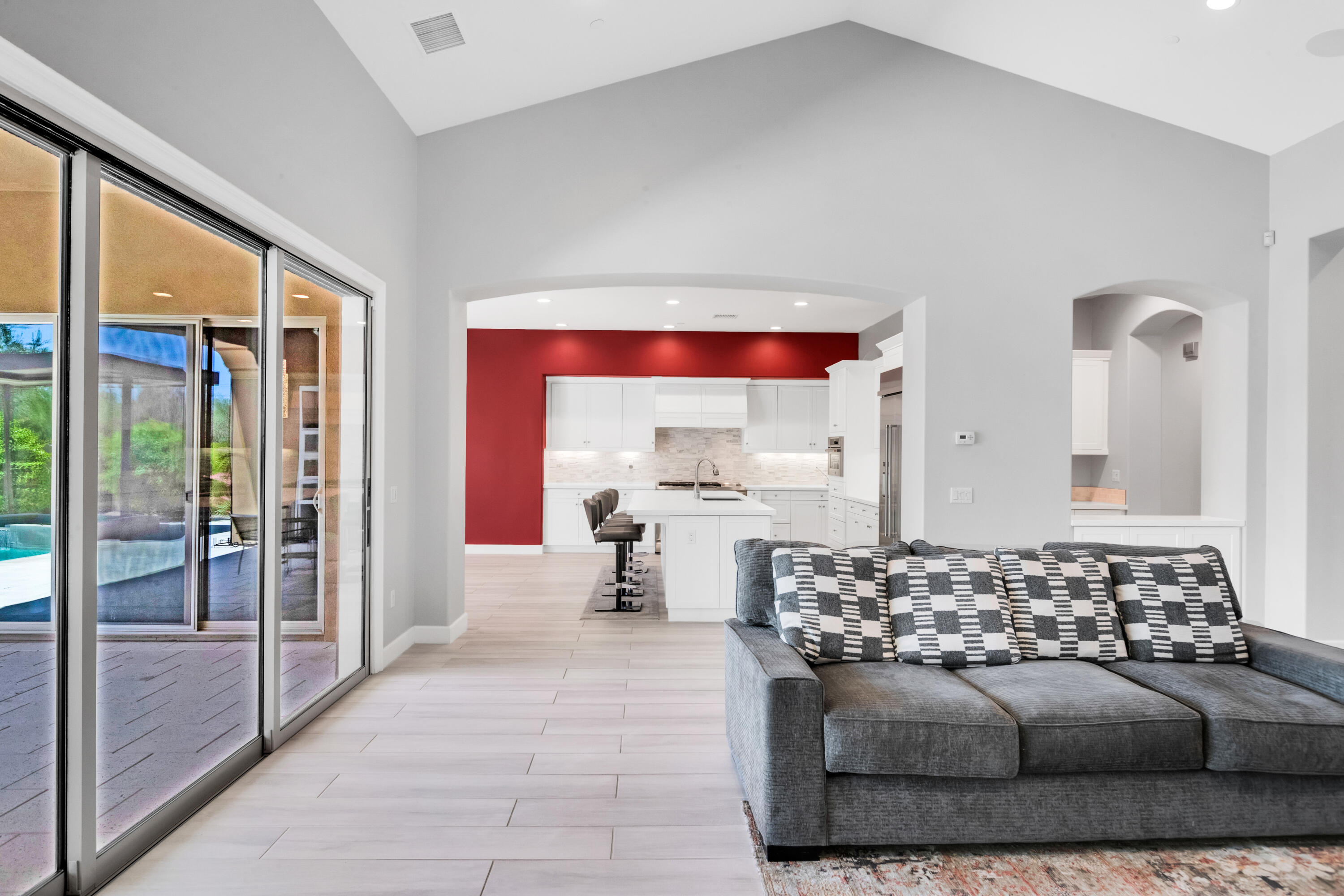 81925 Four Seasons Place La Quinta, CA 92253 - Photo 9 of 27 a living room with a couch and a table