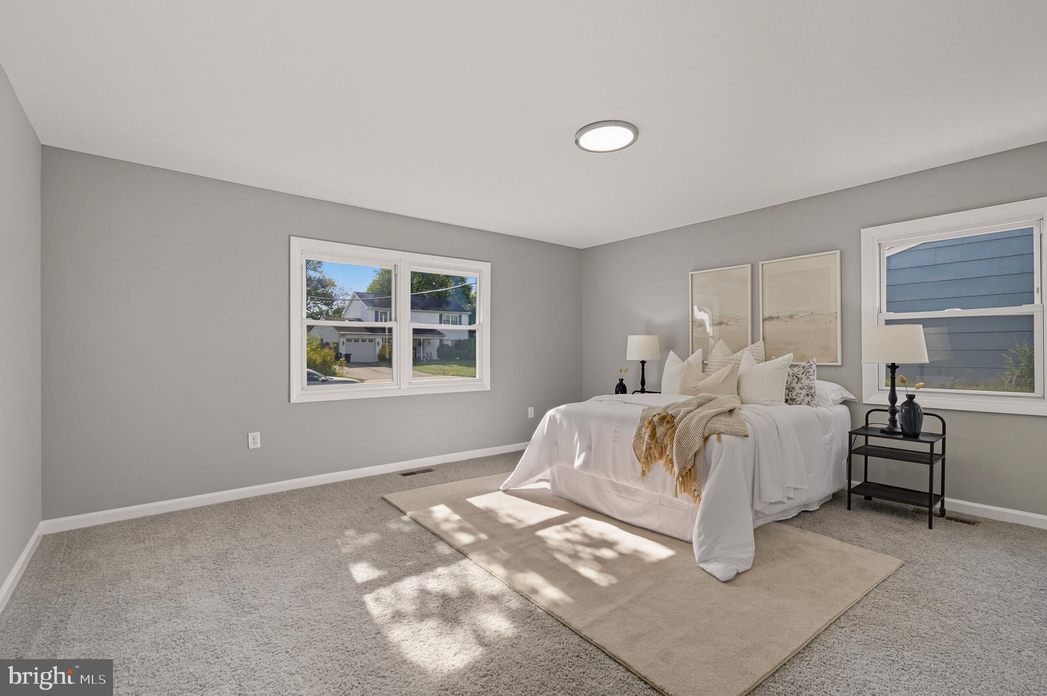 12414 Sandal Lane Bowie, MD 20715 - Photo 24 of 46 a bedroom with bed and window