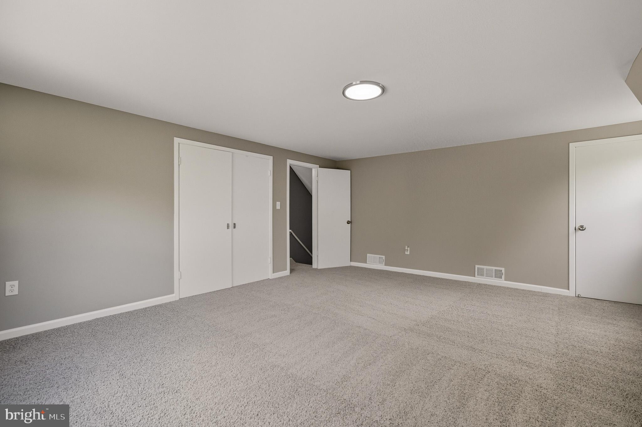 12414 Sandal Lane Bowie, MD 20715 - Photo 32 of 46 a view of an empty room with a window