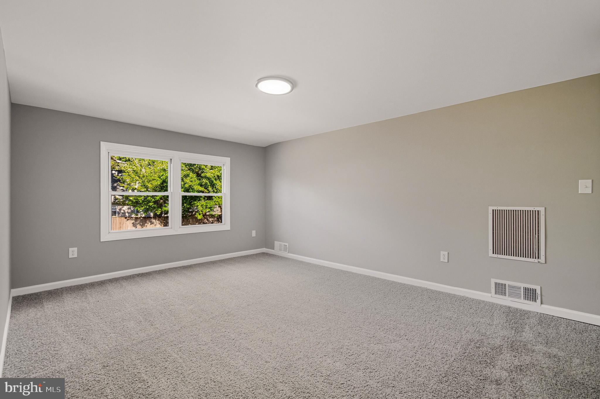 12414 Sandal Lane Bowie, MD 20715 - Photo 35 of 46 a view of an empty room with a window