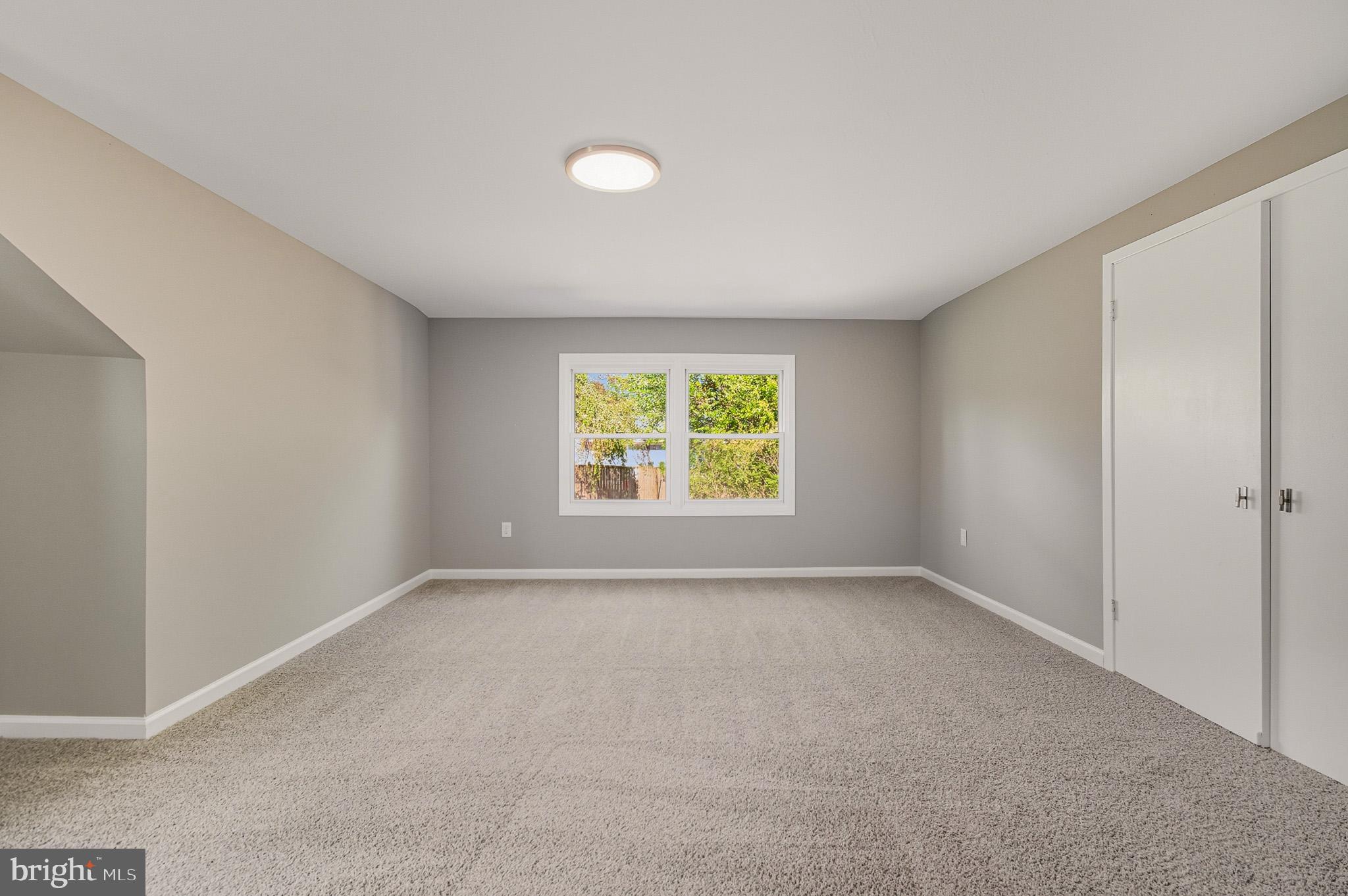 12414 Sandal Lane Bowie, MD 20715 - Photo 38 of 46 an empty room with windows