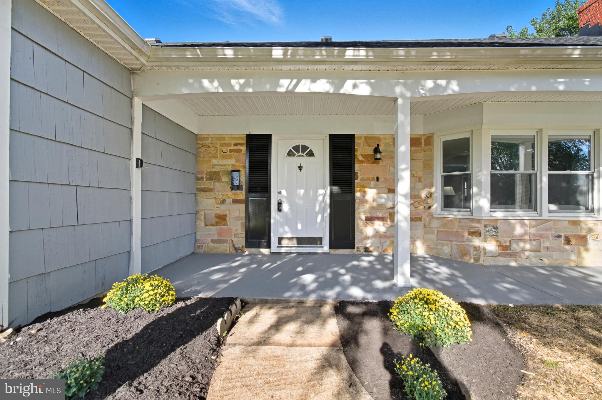 12414 Sandal Lane Bowie, MD 20715 - Photo 4 of 46 a front view of a house
