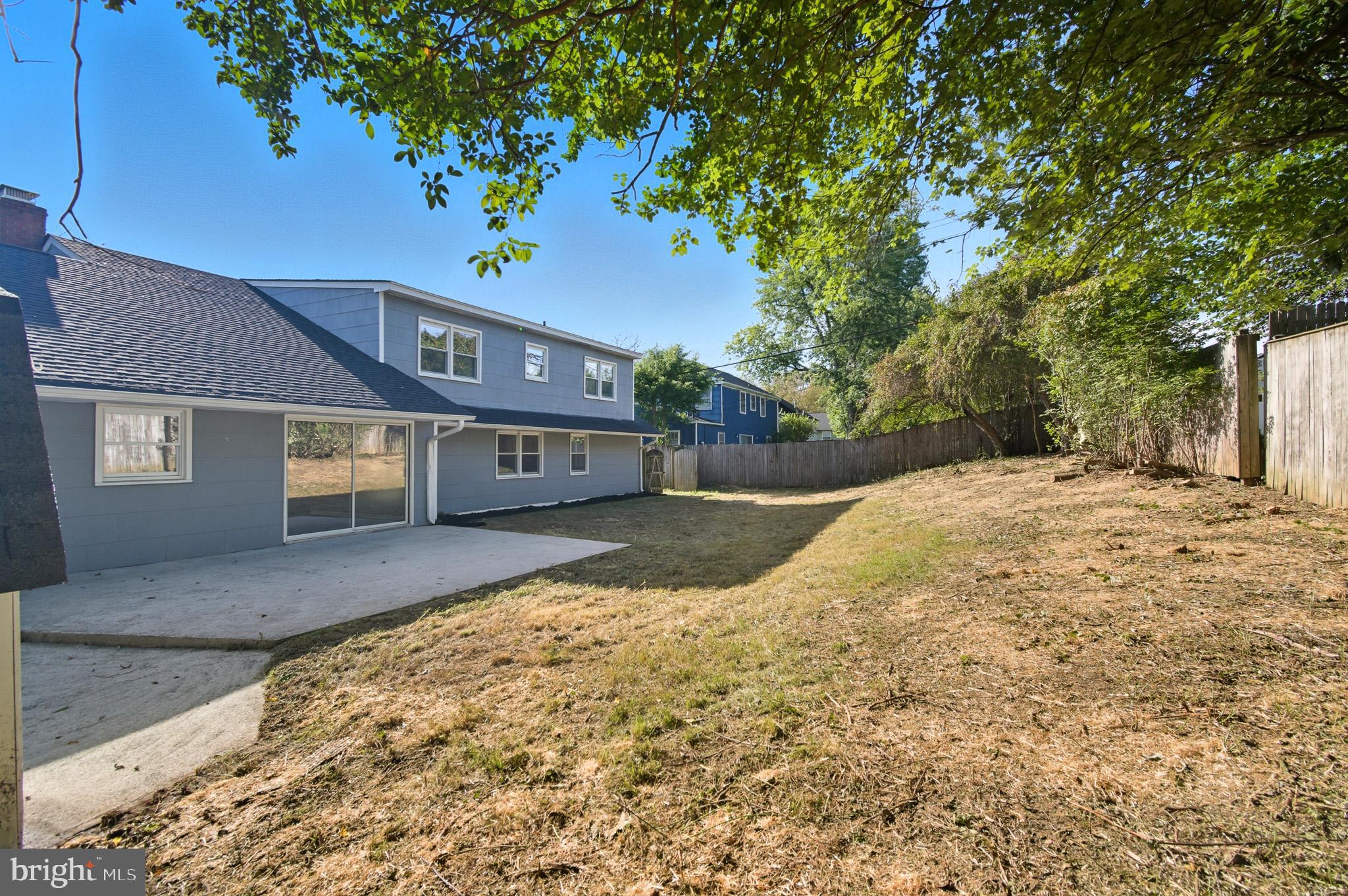 12414 Sandal Lane Bowie, MD 20715 - Photo 45 of 46 a front view of a house with a yard