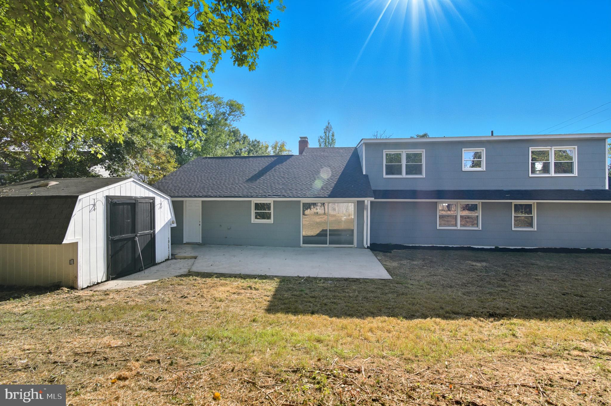 12414 Sandal Lane Bowie, MD 20715 - Photo 46 of 46 a front view of a house with a yard