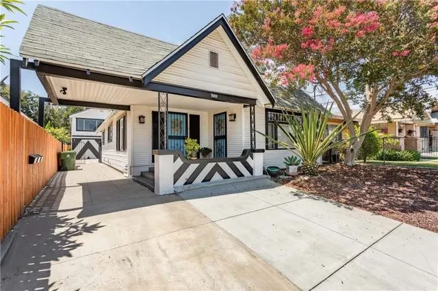 a view of a house with large windows