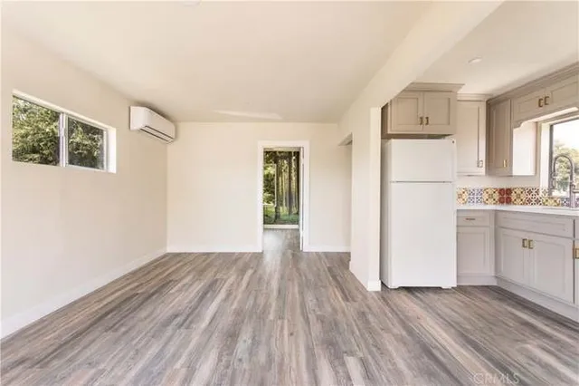 a view of a bathroom with wooden floor