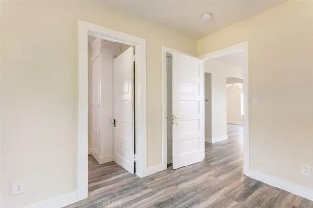 an aerial view of a house with swimming pool and porch