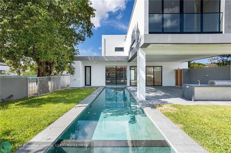 1904 Southwest 22nd Terrace Miami, FL 33145 - Photo 24 of 31 a view of a house with a yard porch and furniture