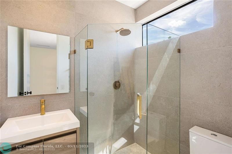 1904 Southwest 22nd Terrace Miami, FL 33145 - Photo 28 of 31 a bathroom with a sink and a mirror