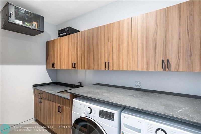 1904 Southwest 22nd Terrace Miami, FL 33145 - Photo 29 of 31 a utility room with dryer and washer