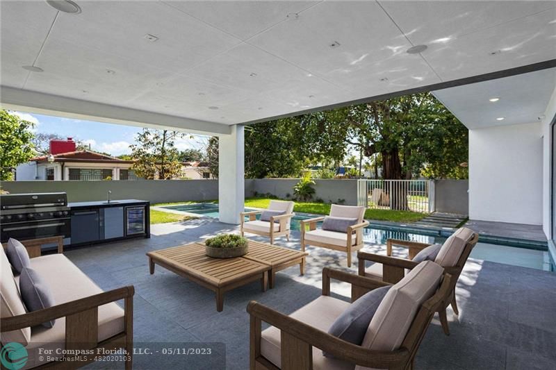 1904 Southwest 22nd Terrace Miami, FL 33145 - Photo 3 of 31 a living room with furniture and a large window