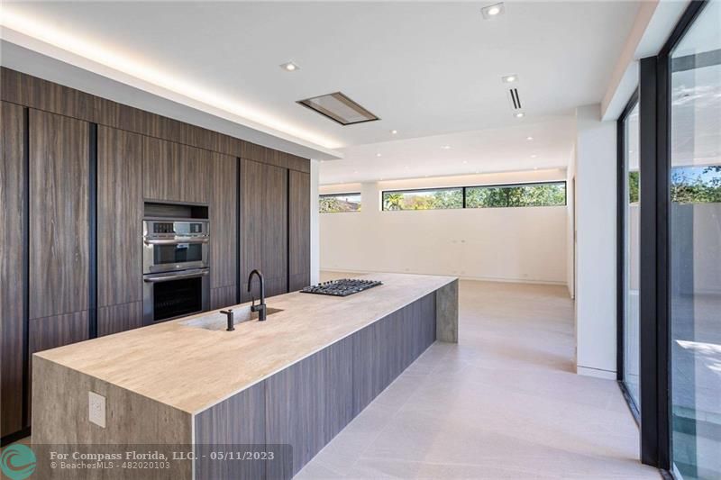 1904 Southwest 22nd Terrace Miami, FL 33145 - Photo 5 of 31 a room with a table and chairs