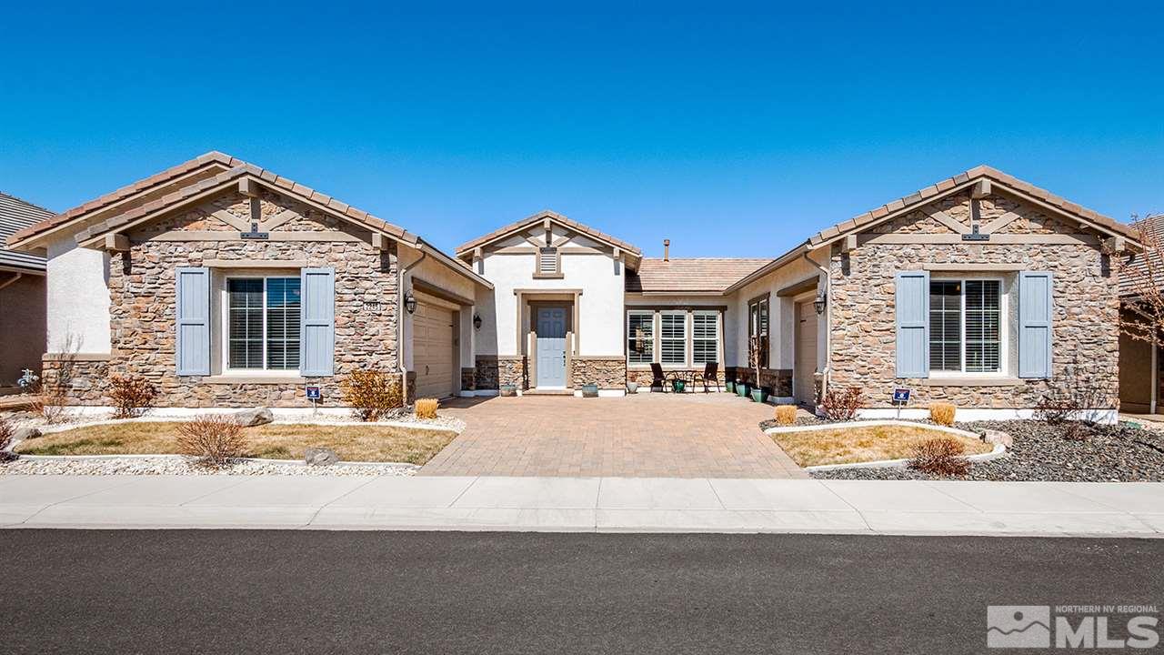 2245 Trakehner Lane Reno, NV 89521 - Photo 1 of 32 a front view of a house with a yard