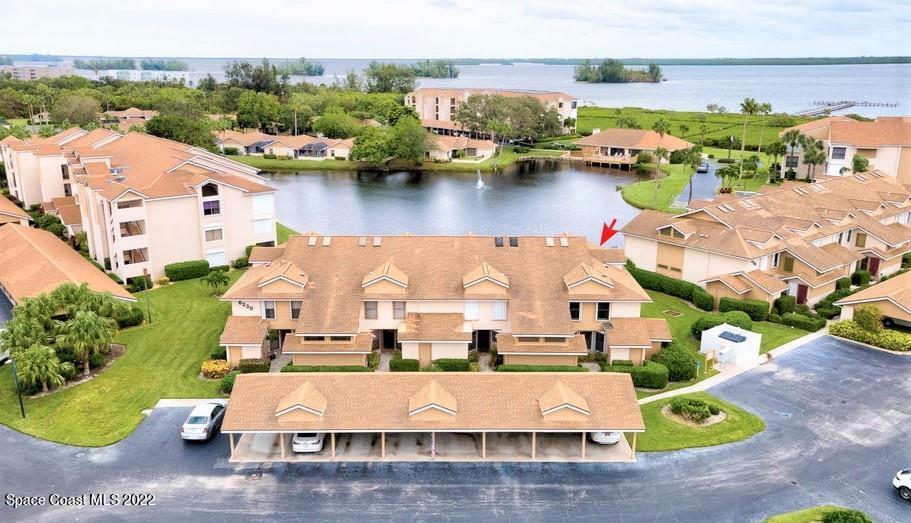 Undisclosed Address Sebastian, FL 32958 - Photo 12 of 33 an aerial view of residential houses with outdoor space and river