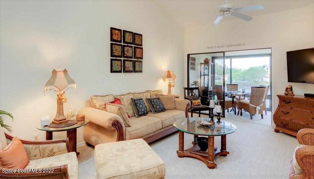 Undisclosed Address Sebastian, FL 32958 - Photo 13 of 33 a living room with furniture and a flat screen tv