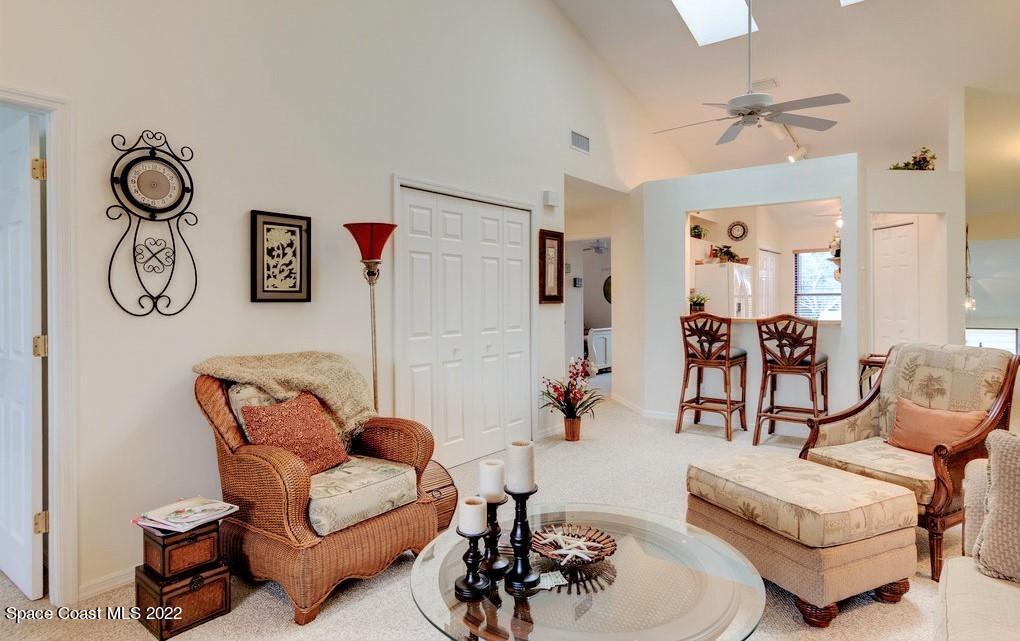 Undisclosed Address Sebastian, FL 32958 - Photo 18 of 33 a living room with furniture and a chandelier