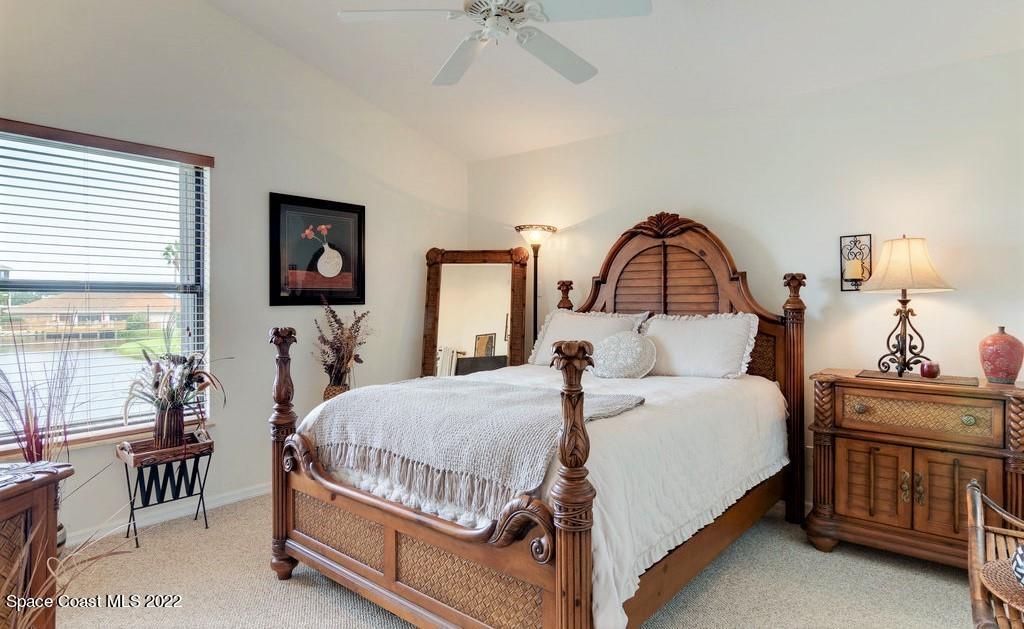 Undisclosed Address Sebastian, FL 32958 - Photo 23 of 33 a bedroom with a bed and a dresser