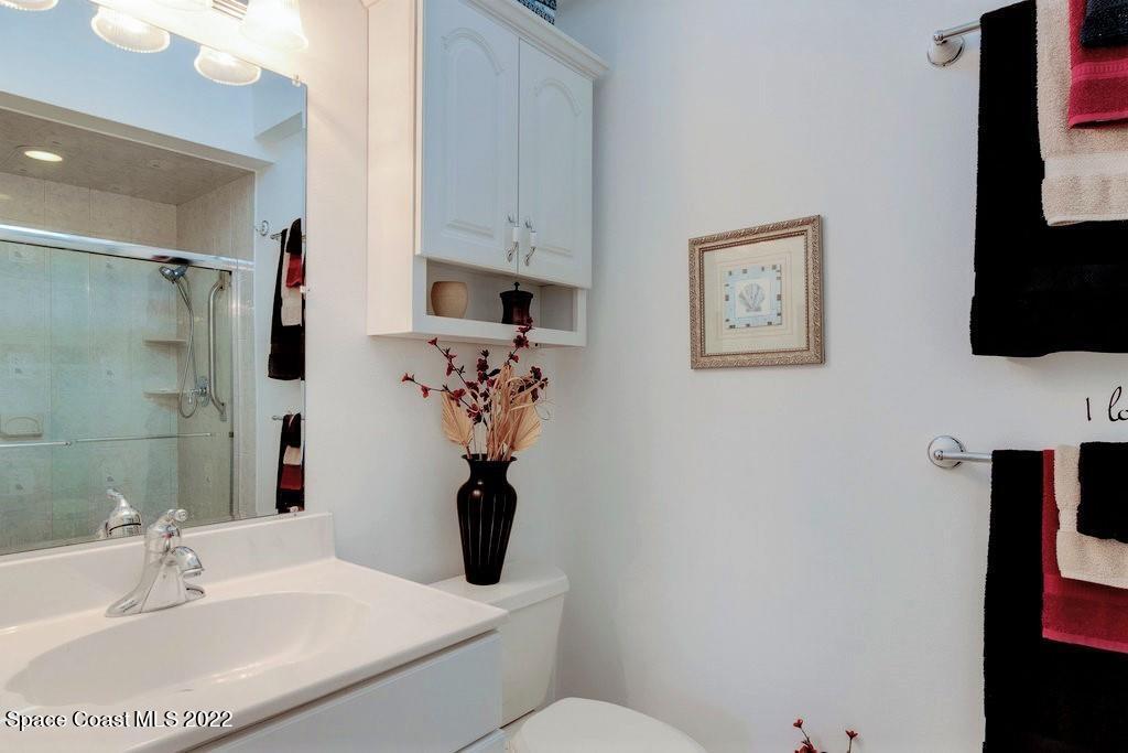 Undisclosed Address Sebastian, FL 32958 - Photo 26 of 33 a bathroom with a sink toilet and shower