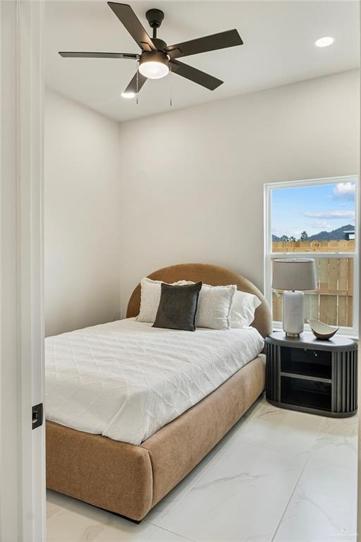 3501 Kerps Street Weslaco, TX 78599 - Photo 12 of 12 a bedroom with a bed and window