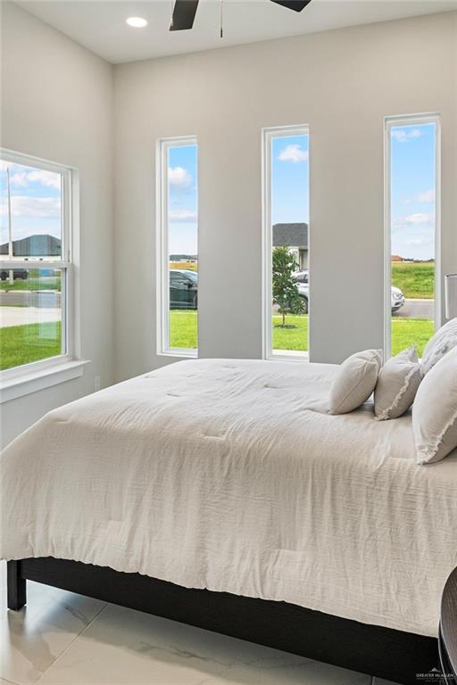 3501 Kerps Street Weslaco, TX 78599 - Photo 10 of 12 a bedroom with a bed and window